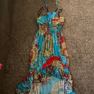 Halter top dress short in the front long in the back. Size large